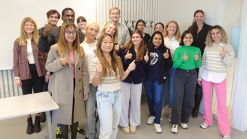 A group of people posing for a picture.