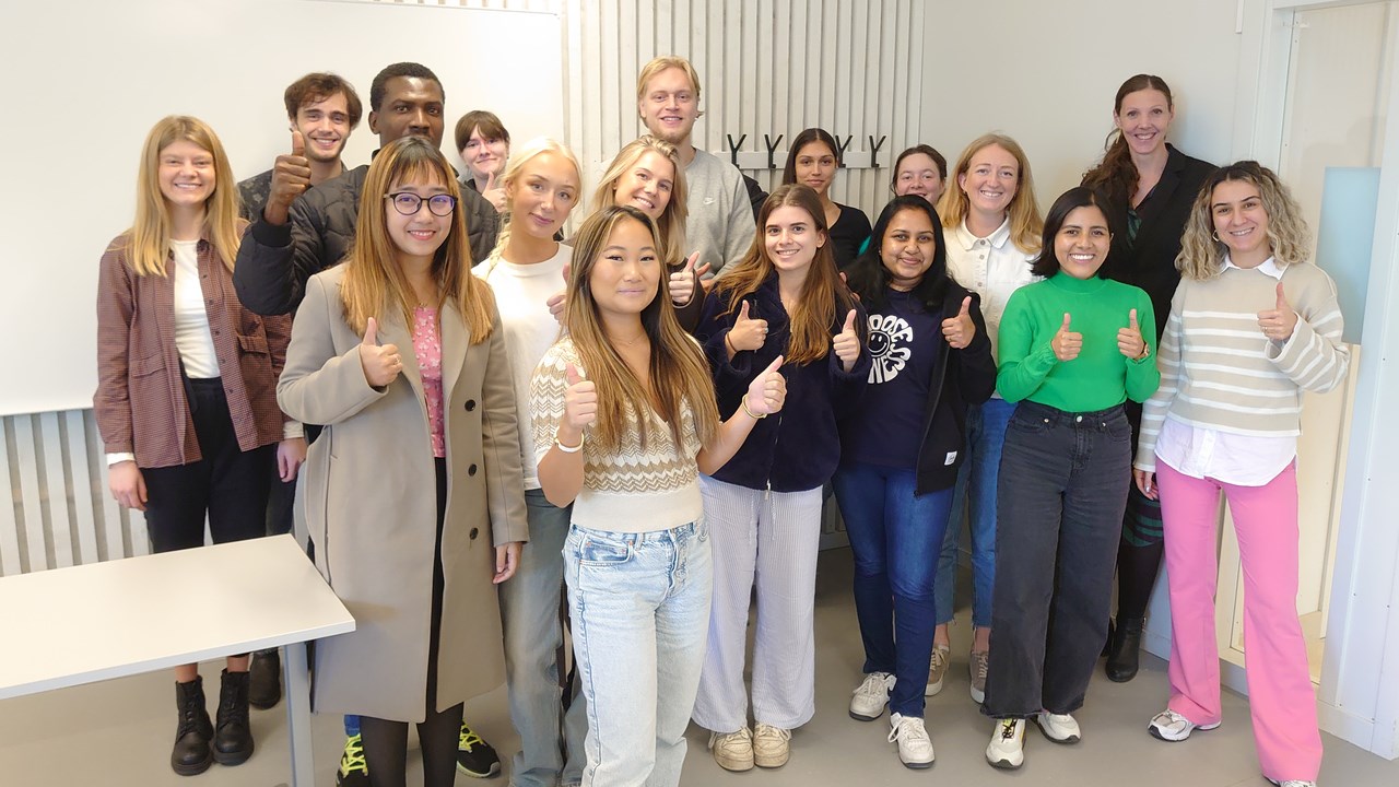 A group of people posing for a picture.