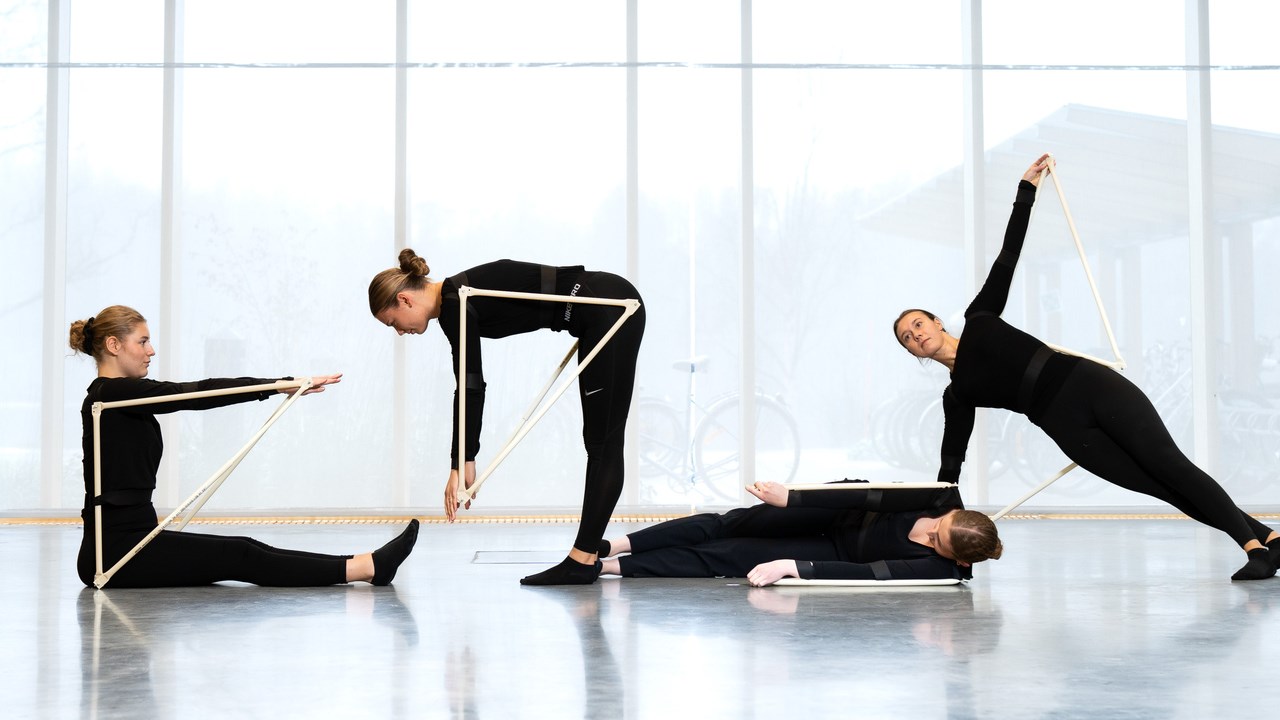 Four female students doing choreographed performance