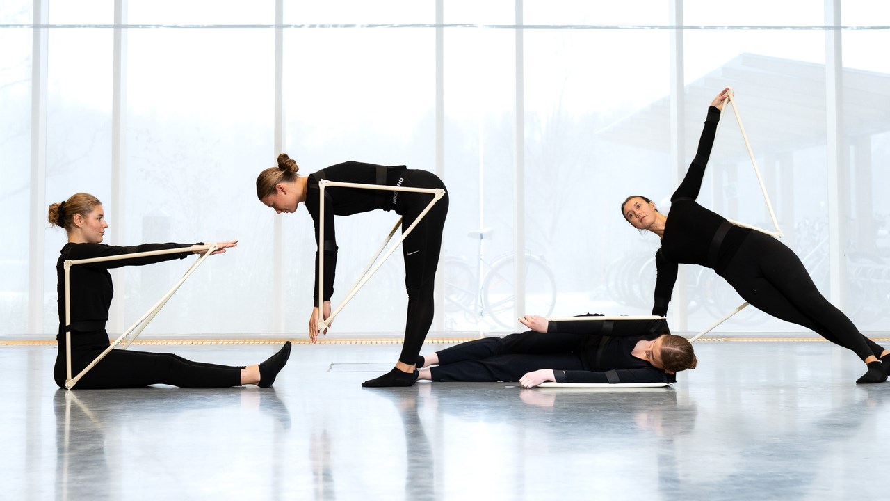 Four female students doing choreographed performance