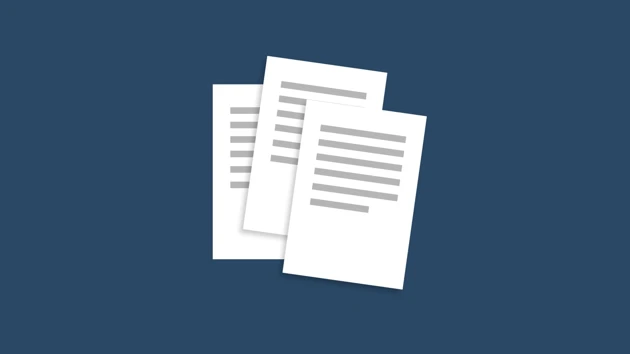 Three documents piled on top of each other.