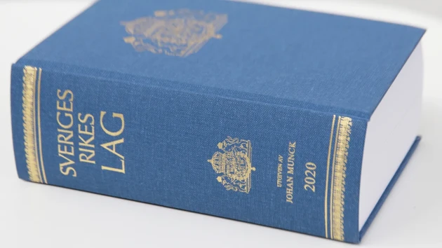 A blue book containing Swedish legislation.  