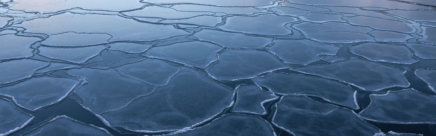 A large body of water covered in ice