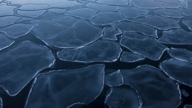 A large body of water covered in ice