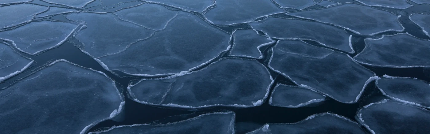 A large body of water covered in ice